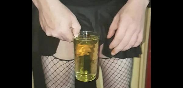  crossdressing sissy drinks his own piss and swollows the lot